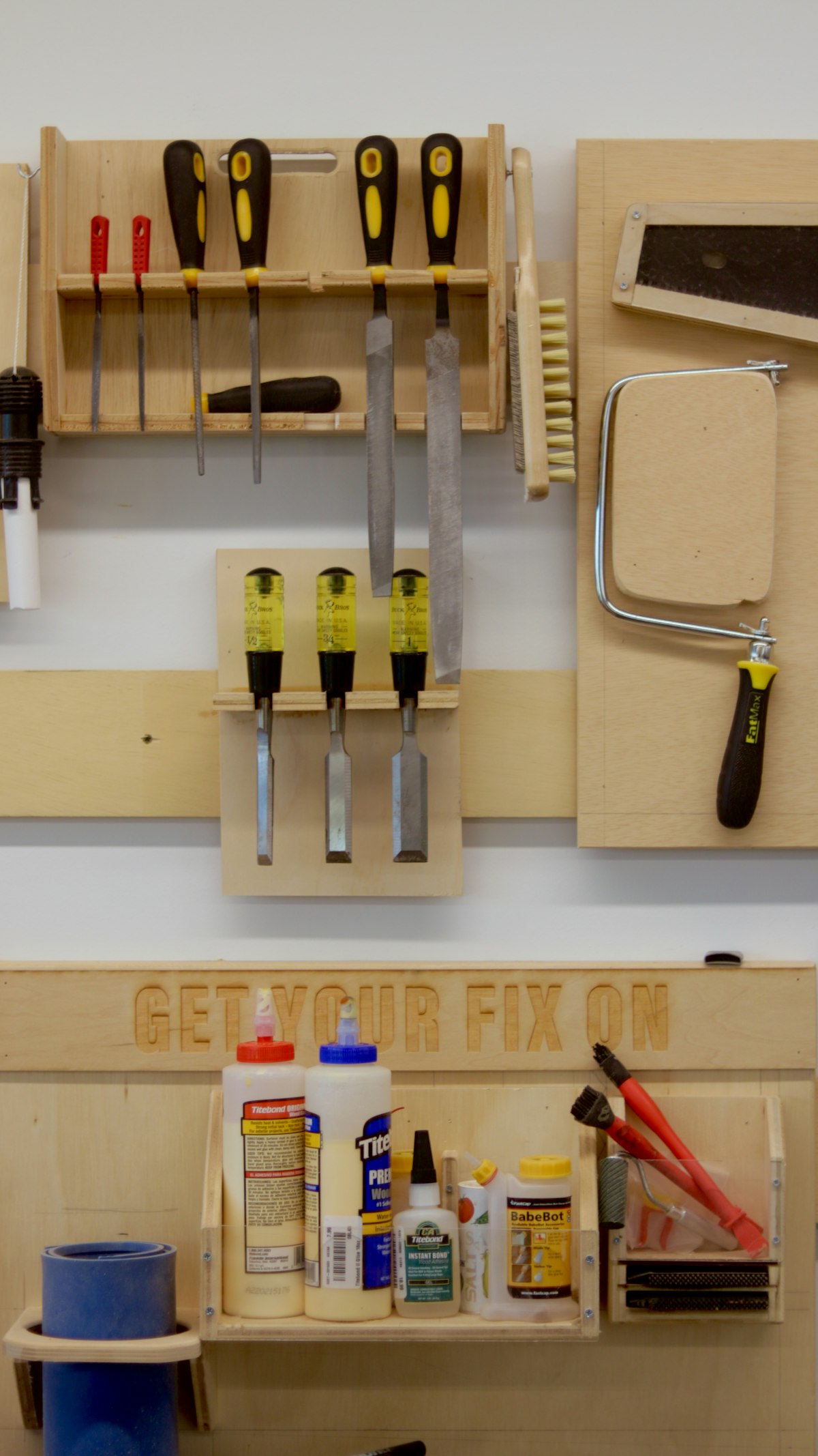 Woodworking tools arranged on a workshop bench