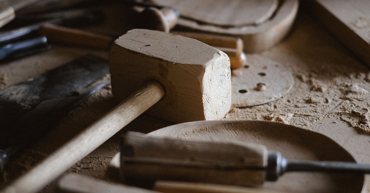 Woodworking chisels and tools arranged on a workbench